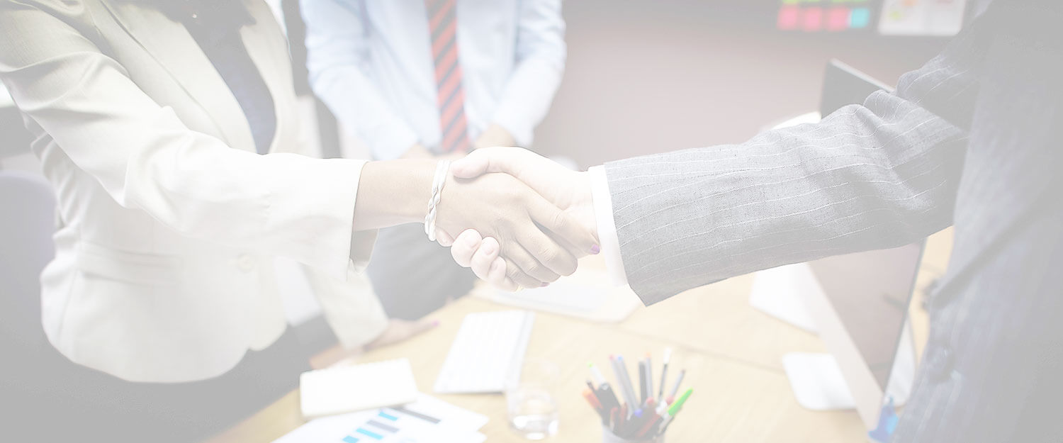 Crystal Lawrence, a Family Law lawyer in the  Edmonton law firm Lawrence and Tkachuk, shakes the hand of the client who she helped by delivering legal services for a competitive legal fee rate.